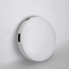 Compact mini USB hand warmer with liquid lithium ion battery and plastic shell.