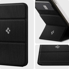 Black magnetic card holder attached to an iPhone for convenient card storage and mobile phone support