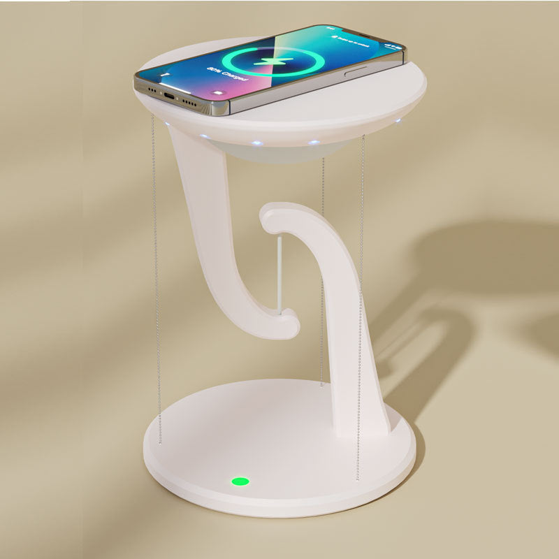 White smartphone stand with a phone on it against a beige background