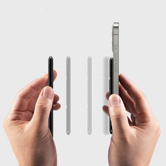 Magnetic card holder attached to black iPhone showing minimalist wallet accessory